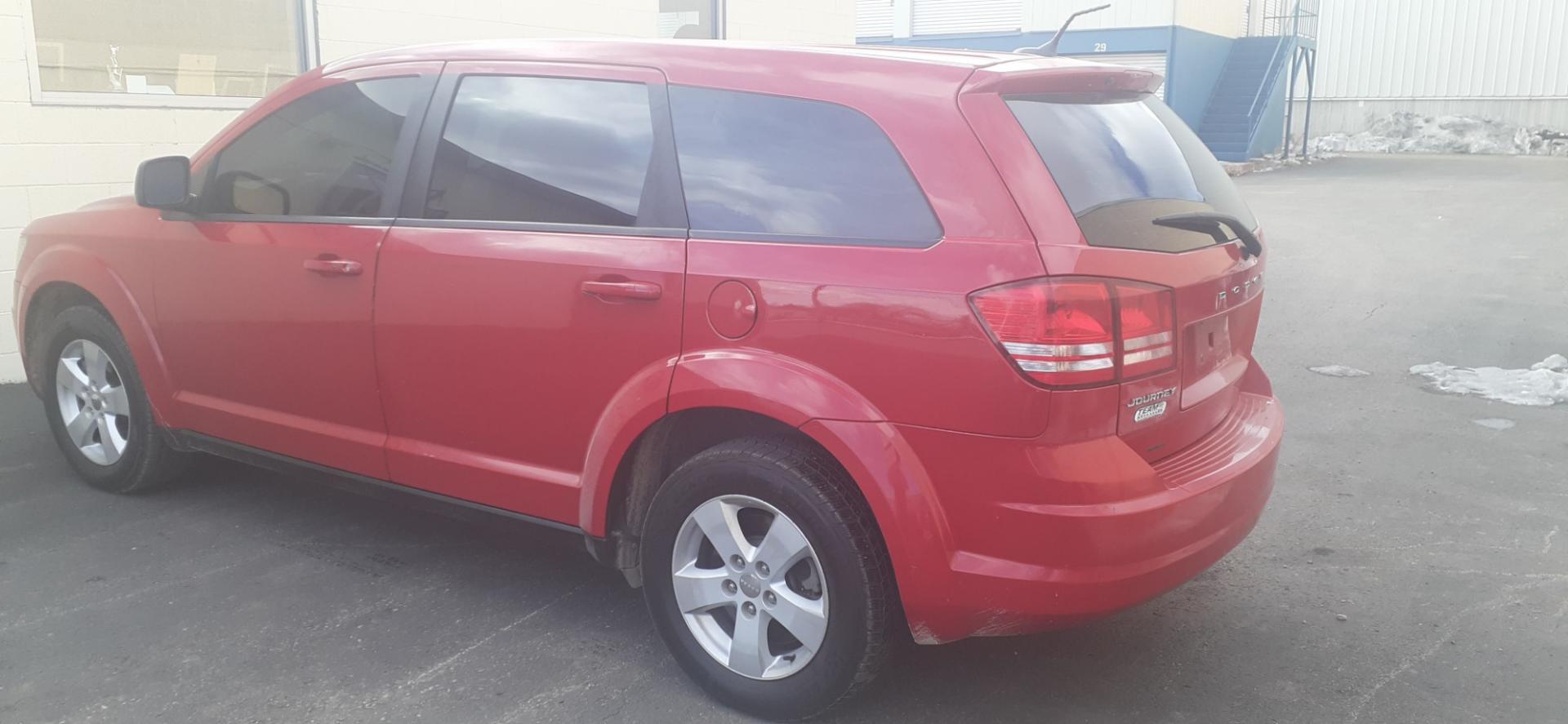 2013 Dodge Journey SE (3C4PDCAB4DT) with an 2.4L L4 DOHC 16V engine, 4-Speed Automatic transmission, located at 2015 Cambell Street, Rapid City, SD, 57701, (605) 342-8326, 44.066433, -103.191772 - Photo#4